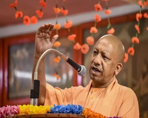 Adityanath hands over keys of houses built on land freed from Atiq Ahmad to 76 PMAY beneficiaries