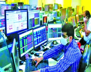 Markets trade lower in initial trade amid weak global trends