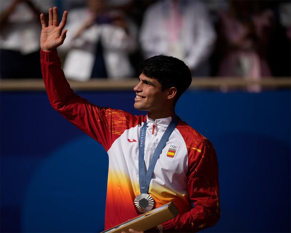 Alcaraz says pressure of playing for Spain got to him in loss to Djokovic in Olympics final