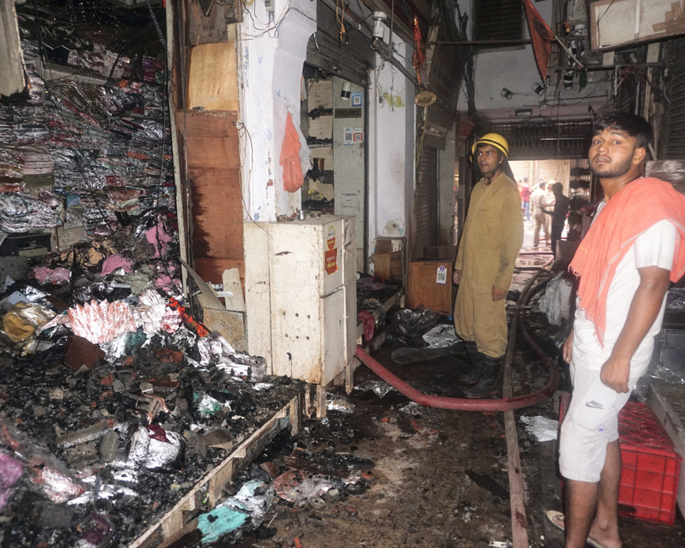 Delhi: Over 50 shops gutted in Chandni Chowk fire, cooling operation underway