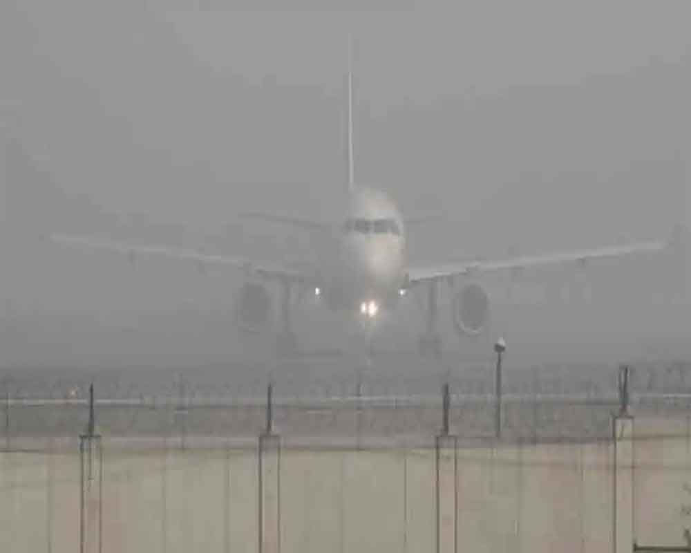 Dense fog shrouds Delhi, hampers flight, train operations; light rain likely