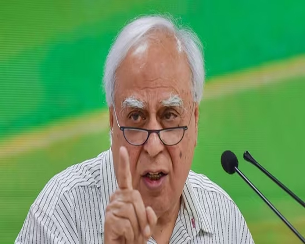 EC must clarify on questions raised by Congress about EVMs: Sibal