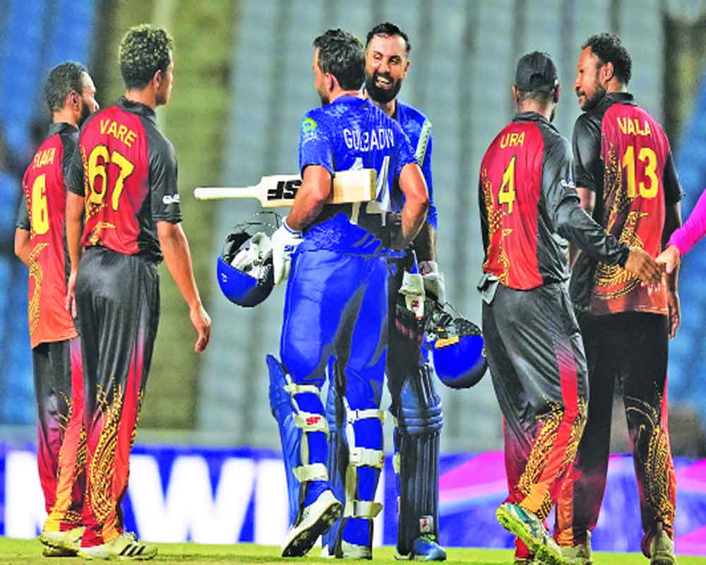 Fantastic Farooqi seals Afghanistan's maiden Super 8 berth with rout of PNG