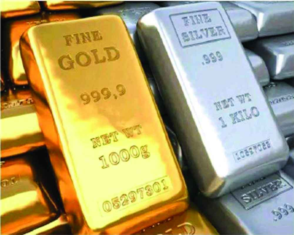 Govt cuts customs duty on gold, silver, mobile phones
