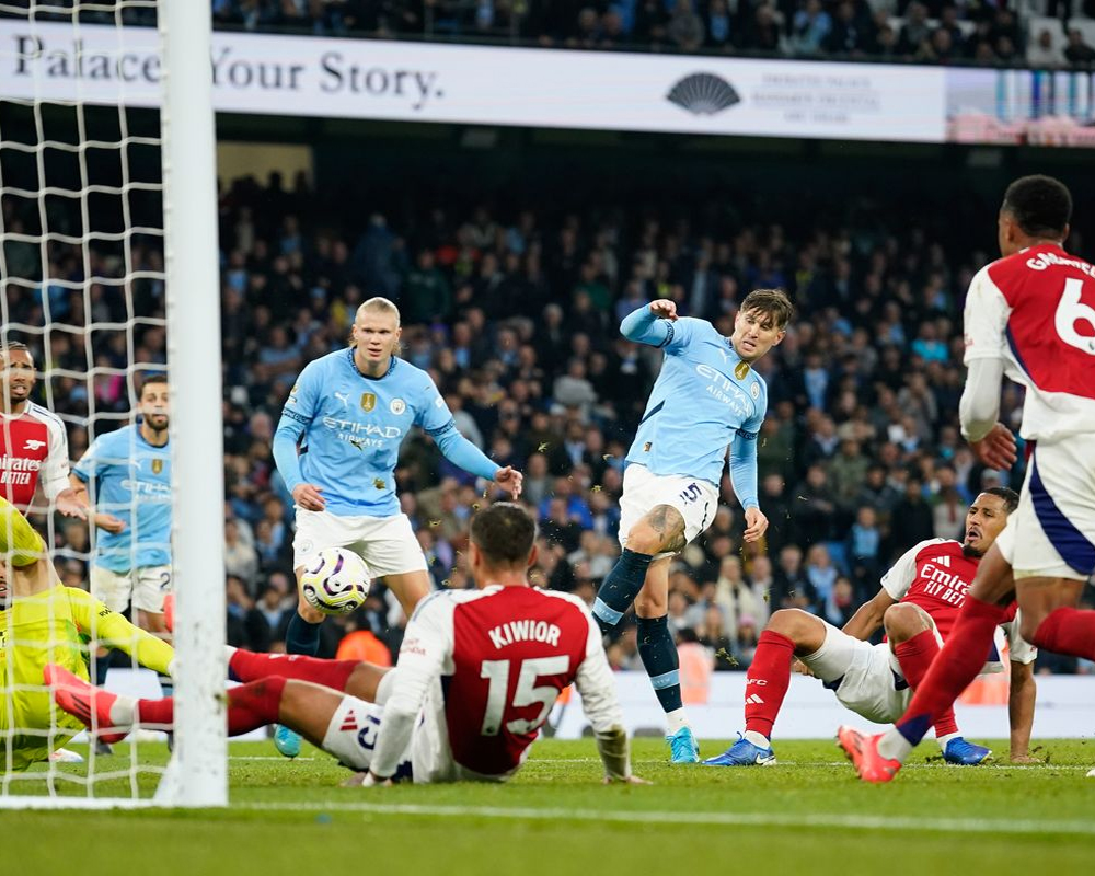 Man City and Arsenal look ready to go the distance again after 2-2 draw