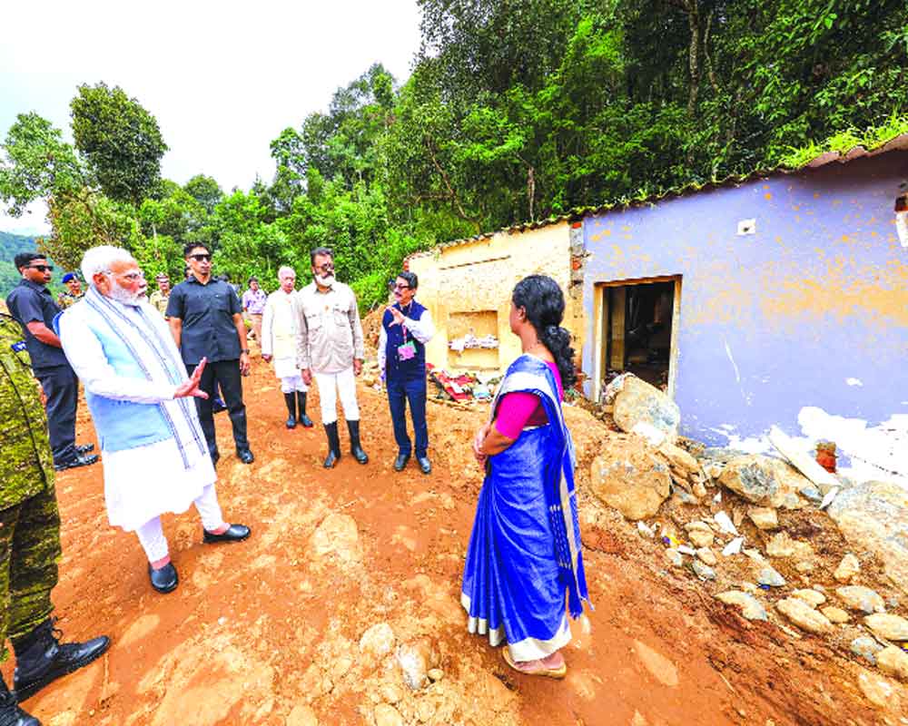 Modi vows to rebuild ruined Wayanad