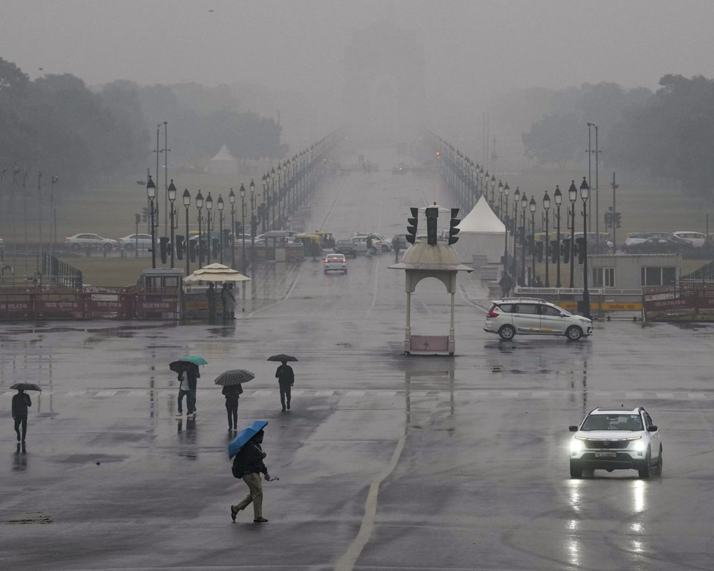 Rain lashes Delhi, 'orange' warning issued