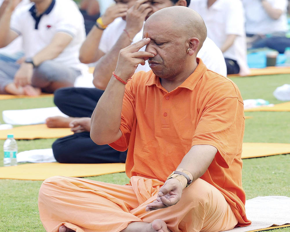 World embraced yoga due to PM Modi's efforts: UP CM