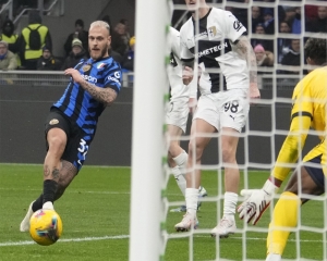 Atalanta tops Serie A after late win over AC Milan while Inter goes 13 games unbeaten