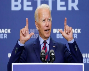 Determined to run in re-election, will defeat Trump: US President Biden
