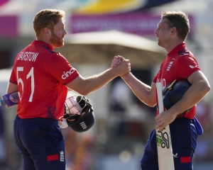 England beats Oman by 8 wickets to boost chances at T20 World Cup