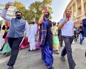 Oppn MPs take out protest march in Parliament against industrialist Adani