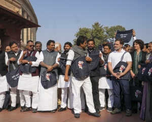 Opposition MPs protest on Adani issue in Parliament premises with black 'jholas'