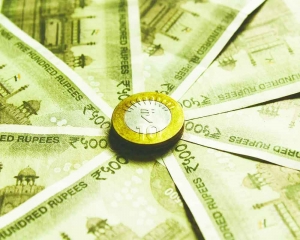 Rupee falls 5 paise to close at 83.56 against US dollar