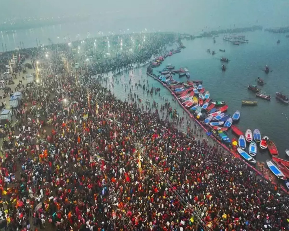 International delegates take dip at Sangam, laud Maha Kumbh for spreading message of unity