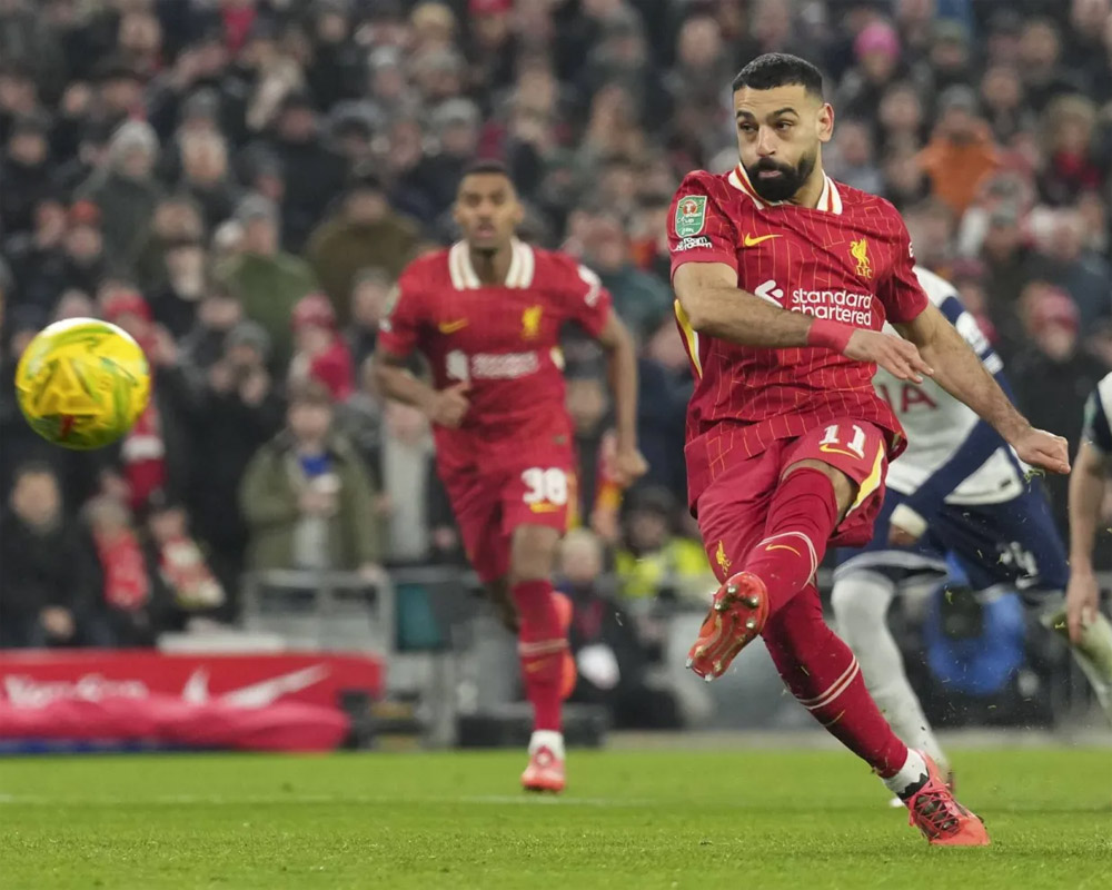 Liverpool routs Tottenham 40 to set up English League Cup final