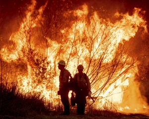 LA area's 2 biggest blazes burn at least 10,000 structures, 10 killed