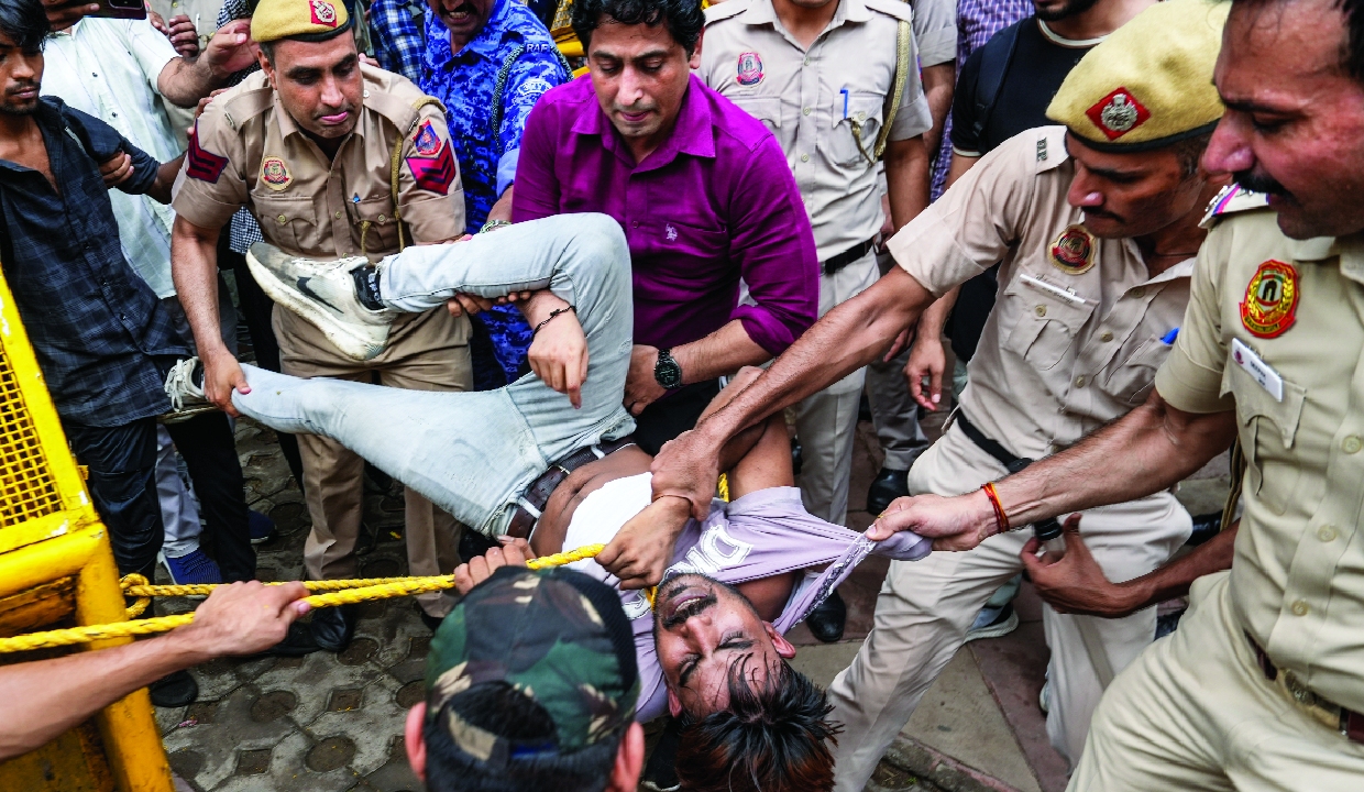 118 police, 60 protesters injured; 70 detained as protest turns violent