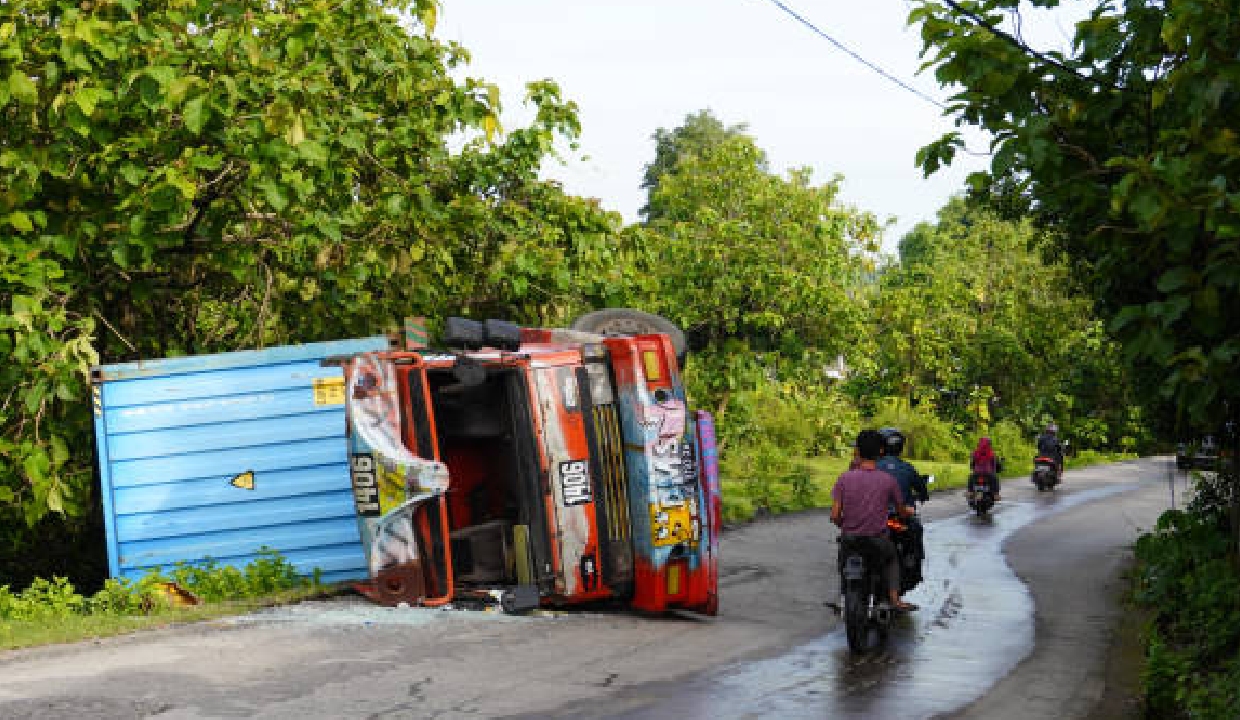 23 hurt as bus, truck plunges off bridge in Andhra