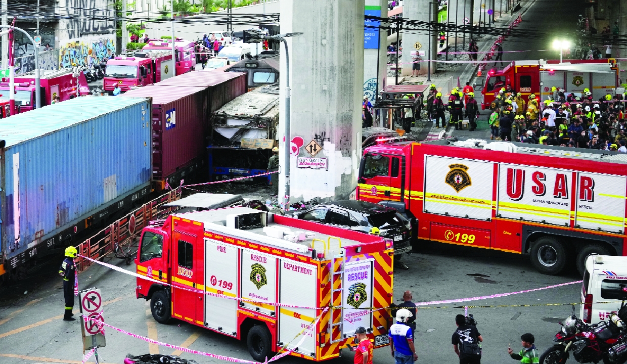 Cargo train hits public bus in Bangkok, eight people killed