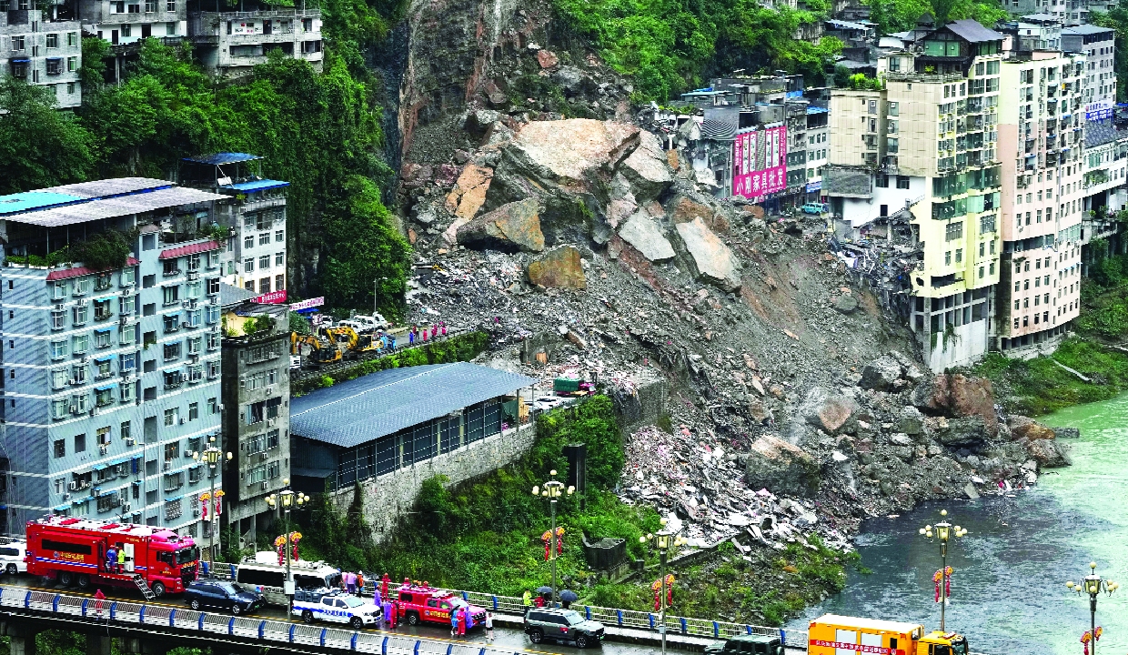 China: Rescuers race to find survivors after landslide