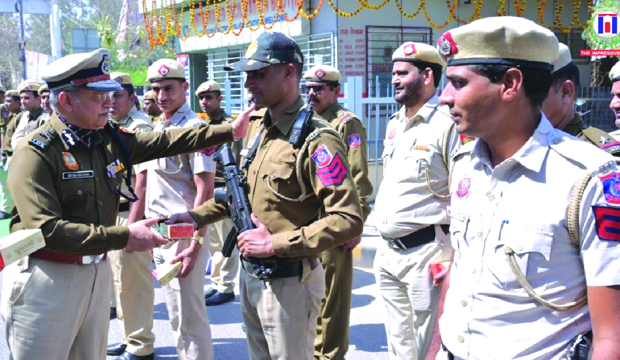 Delhi Police chief reviews security, meets staff on Holi