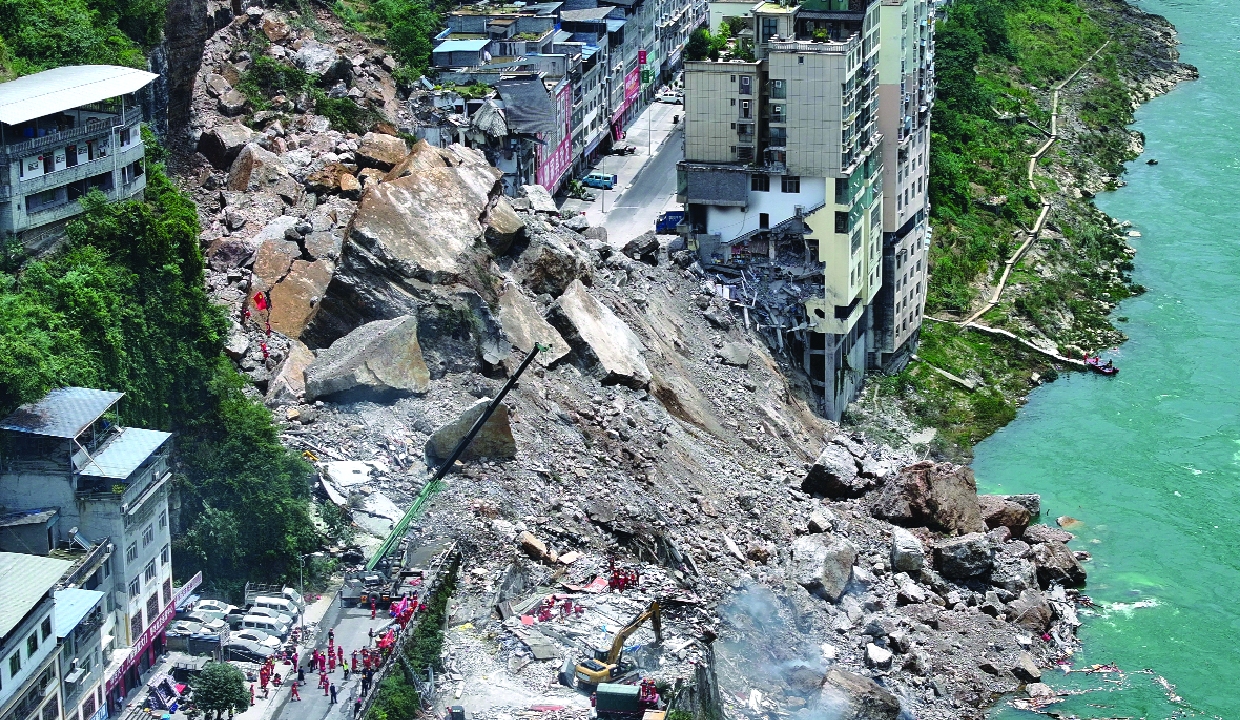 Landslide in China kills eight, leaves 34 missing