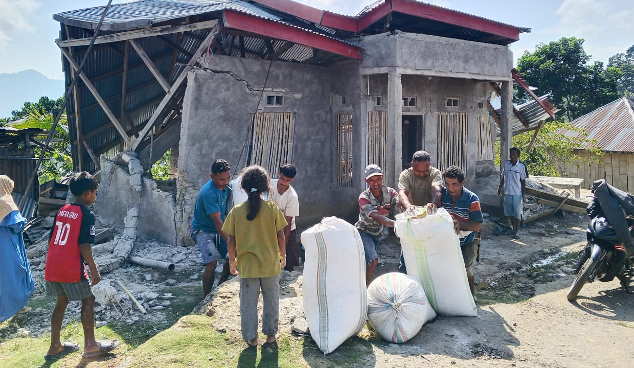 Magnitude 7.7 quake off Indonesia kills 38, landslide buries 16
