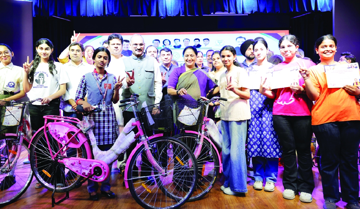 Rekha Gupta distributes bicycles to girl students