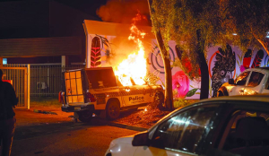 Angry crowd riots outside Austalian hospital