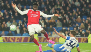 Arsenal beats Brighton to move ahead in title race