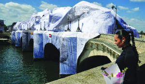 Artist JR, ‘French Banksy’ creates ‘cave’ installation over Paris’ oldest bridge