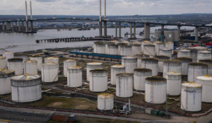 Asian markets mixed as Brent crude slips below $100