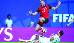 Austria, Algeria both advance at World Cup with stunning 3-3 draw