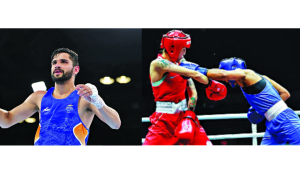 Boxer Sachin one win away from medal, Preeti bows out