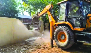 Bulldozers move into Sainik Farms