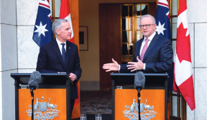 Canada, Australia leaders urge de-escalation