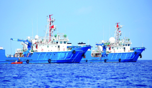 China holds military drills near disputed shoal in South China Sea