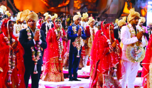 CM Rekha attends mass marriage ceremony