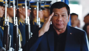 Ex-Philippine president to face trial on charges of crimes against humanity