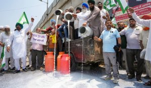 Farmers protest by spilling milk on roads in Amritsar to target fake dairy products