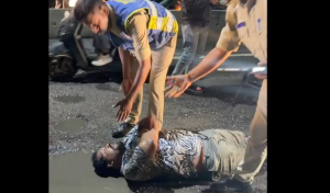 Fed up with potholes, Hyderabad man lies on road in protest