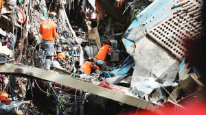 Filipino rescuers detect ‘signs of life’ in garbage avalanche that killed 4