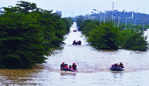 Floods in southern China leave 39 dead amid heavy rains, storm