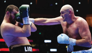 Fury dominates Makhmudov in latest comeback