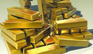 Gold extends losses in futures trade amid inflation, West Asia crisis