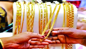 Gold falls Rs 2,308/10g in futures on strong dollar, higher crude oil