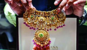 Gold slides Rs 500 as oil surges, strong US dollar weigh on bullion
