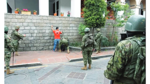 Gunmen in military uniforms storm a rural Ecuador property, killing 7