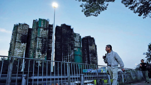 Hong Kong officials want to expand oversight of building maintenance